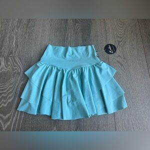 ExoticAthletica Performance High Waisted Ruffle Skort in Dusty Pale Blue